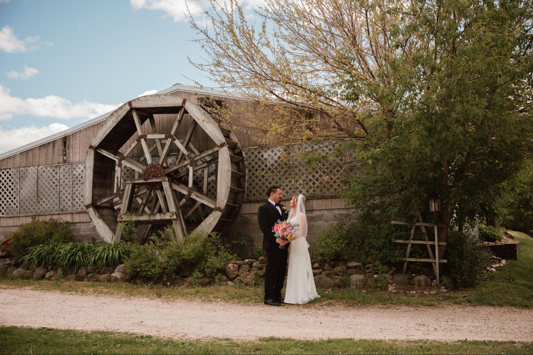 Couple by the water wheel